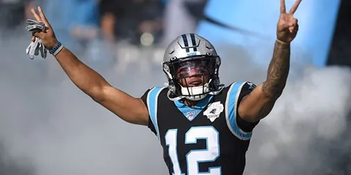 Bears trade number one pick to Panthers for wide receiver DJ Moore Image