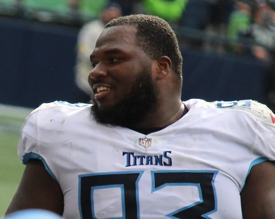 Three NFL players sign identical contracts Image
