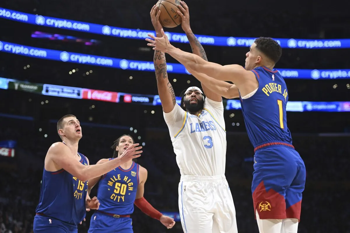 James, Davis lead Lakers past Nuggets, earn first win of season Image