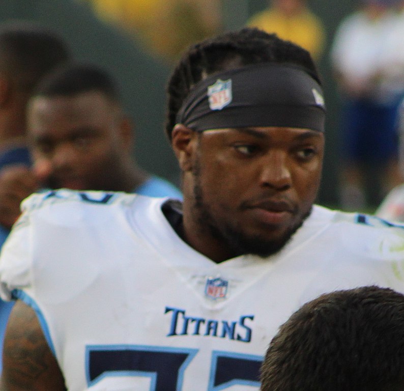 Derrick Henry throws, runs Titans past Packers