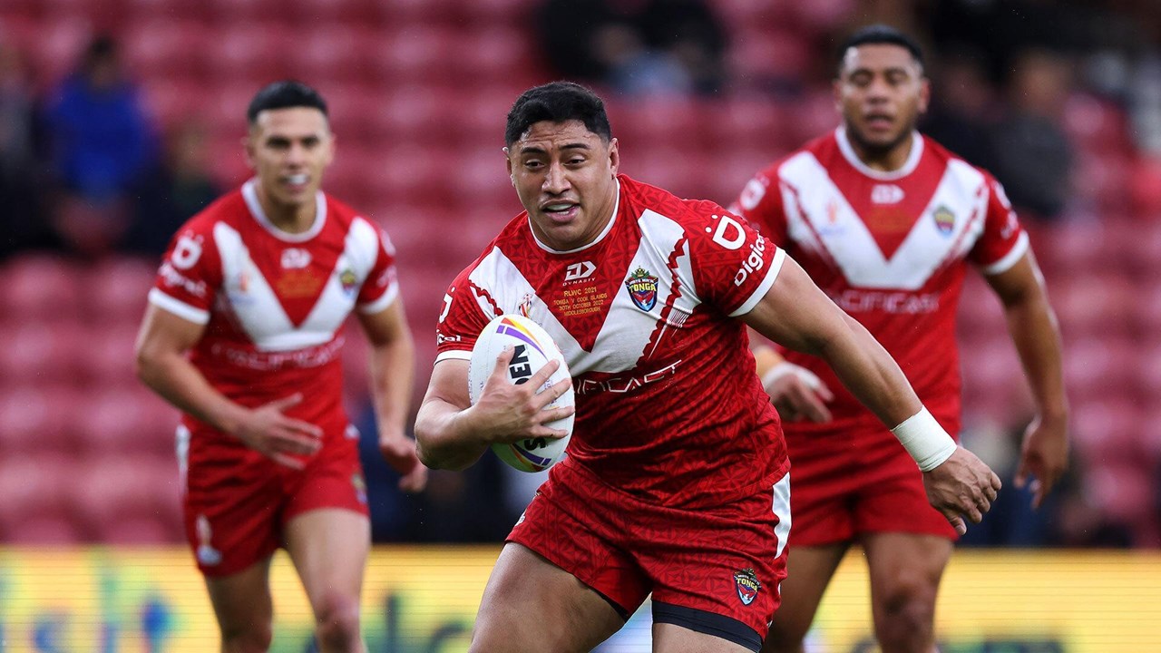 Tonga's Will Penisini scores a try during the Rugby League World