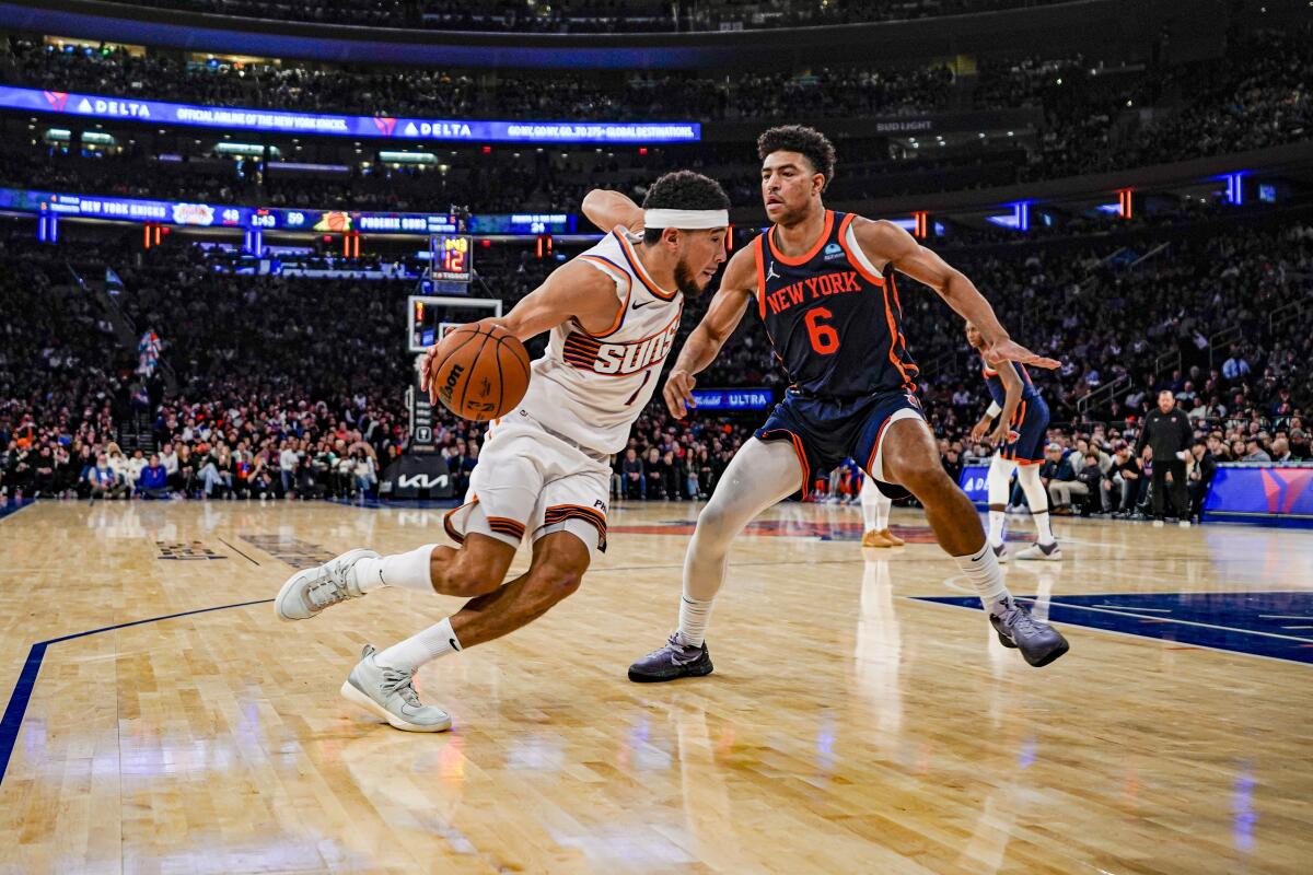 Booker triple sinks Knicks as Suns win 6th in a row