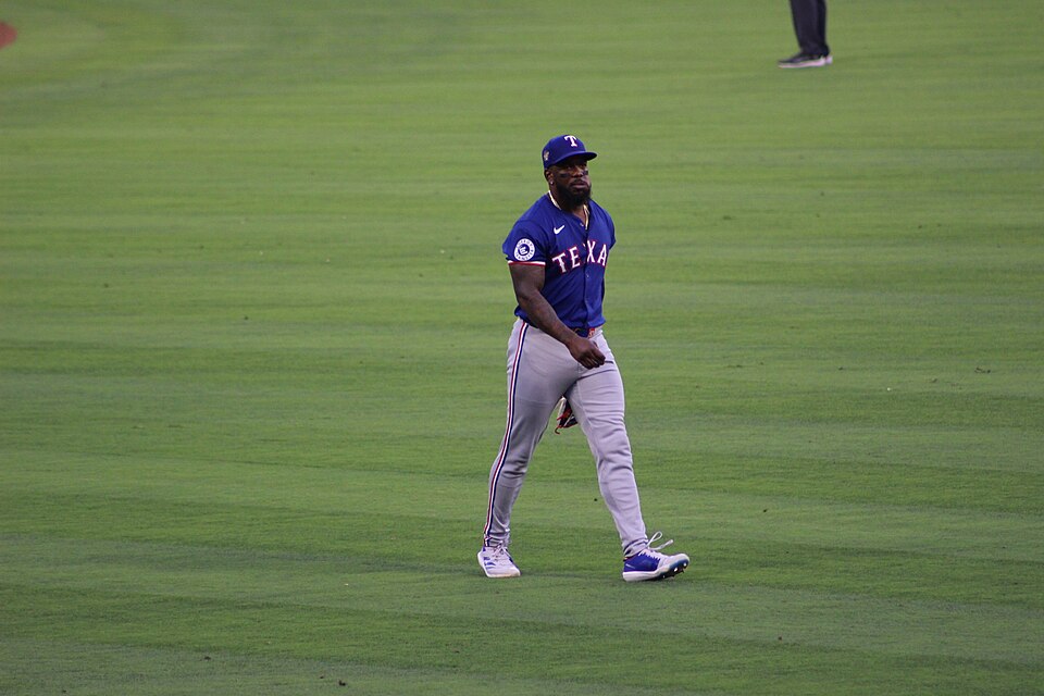 Outfielders Isaac Collins and Adolis Garcia switch teams